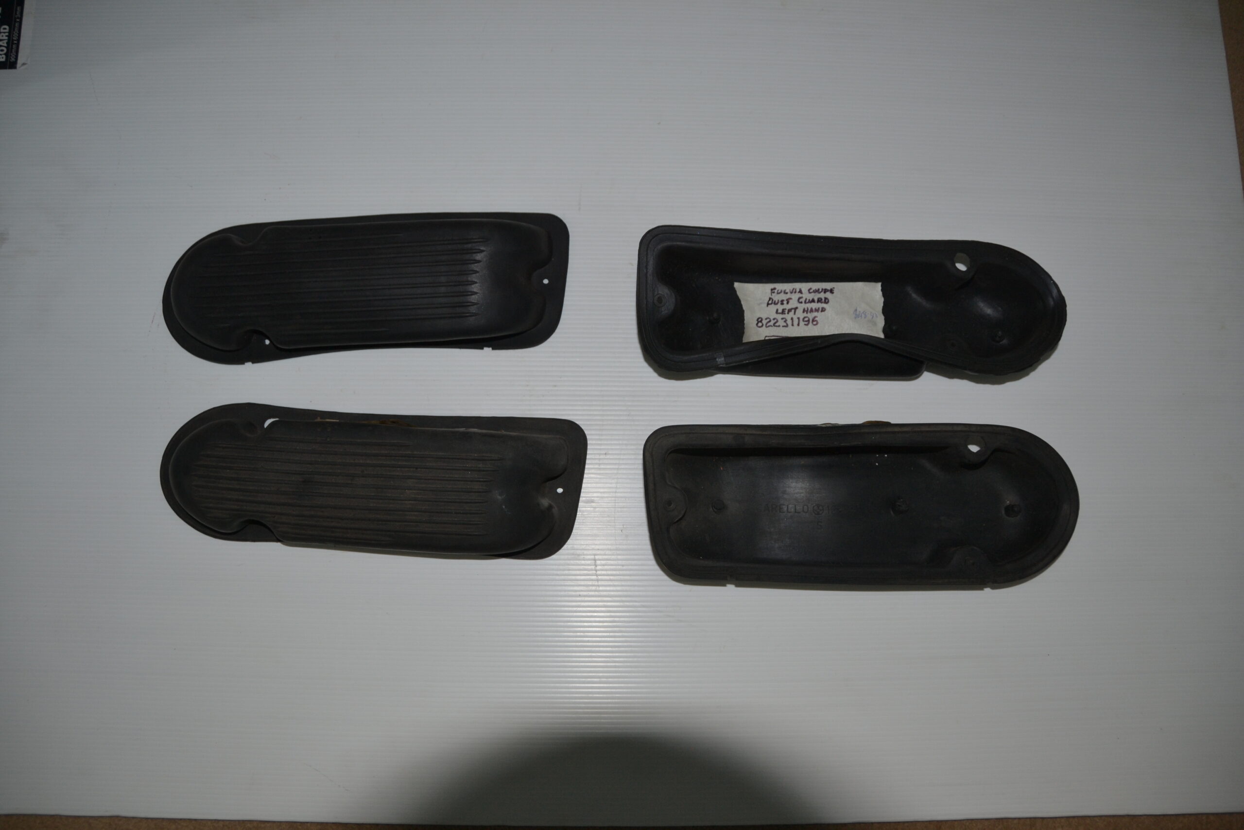 Dust guard - Left hand side rear taillight. Fulvia coupe